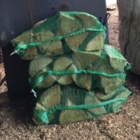 Three bags of logs